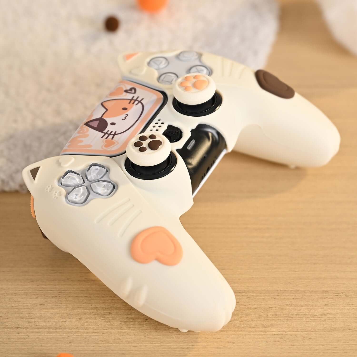 GeekShare Calico Cat PS5 skin on Dualsense controller, featuring non-slip silicone design with cat-themed pattern for PlayStation 5.